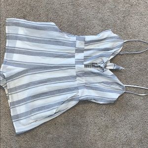 Grey and white striped romper with smocked backing